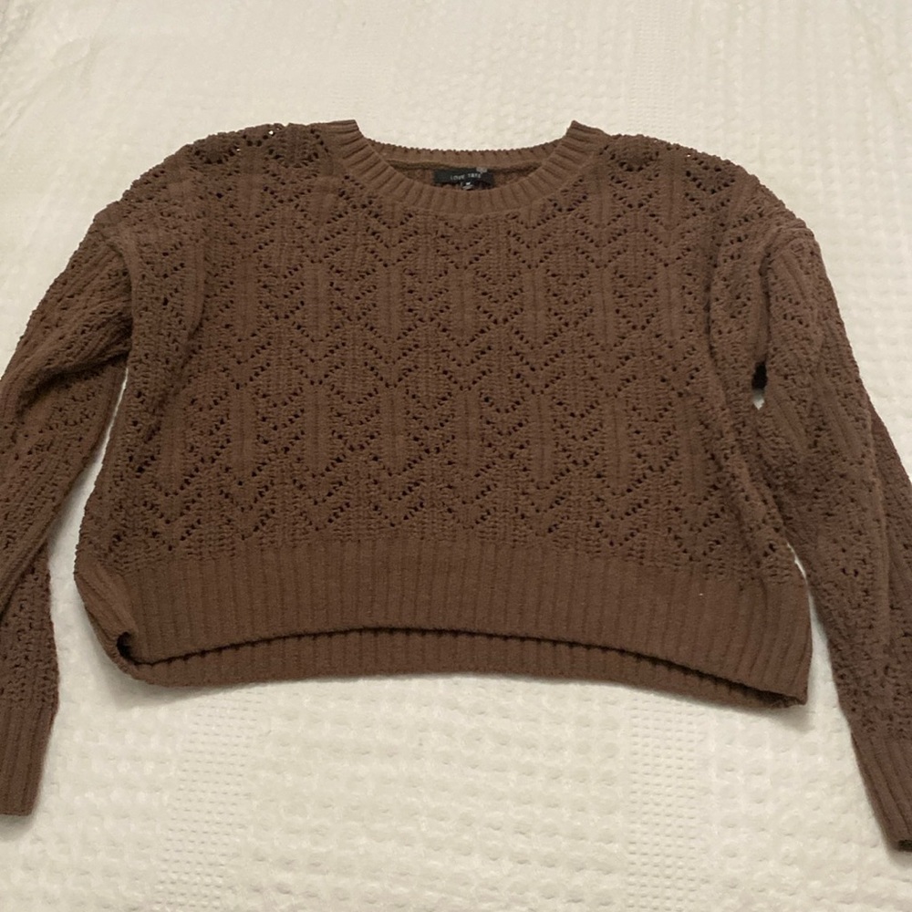 This is a very cute sweater that is very chic and stylish